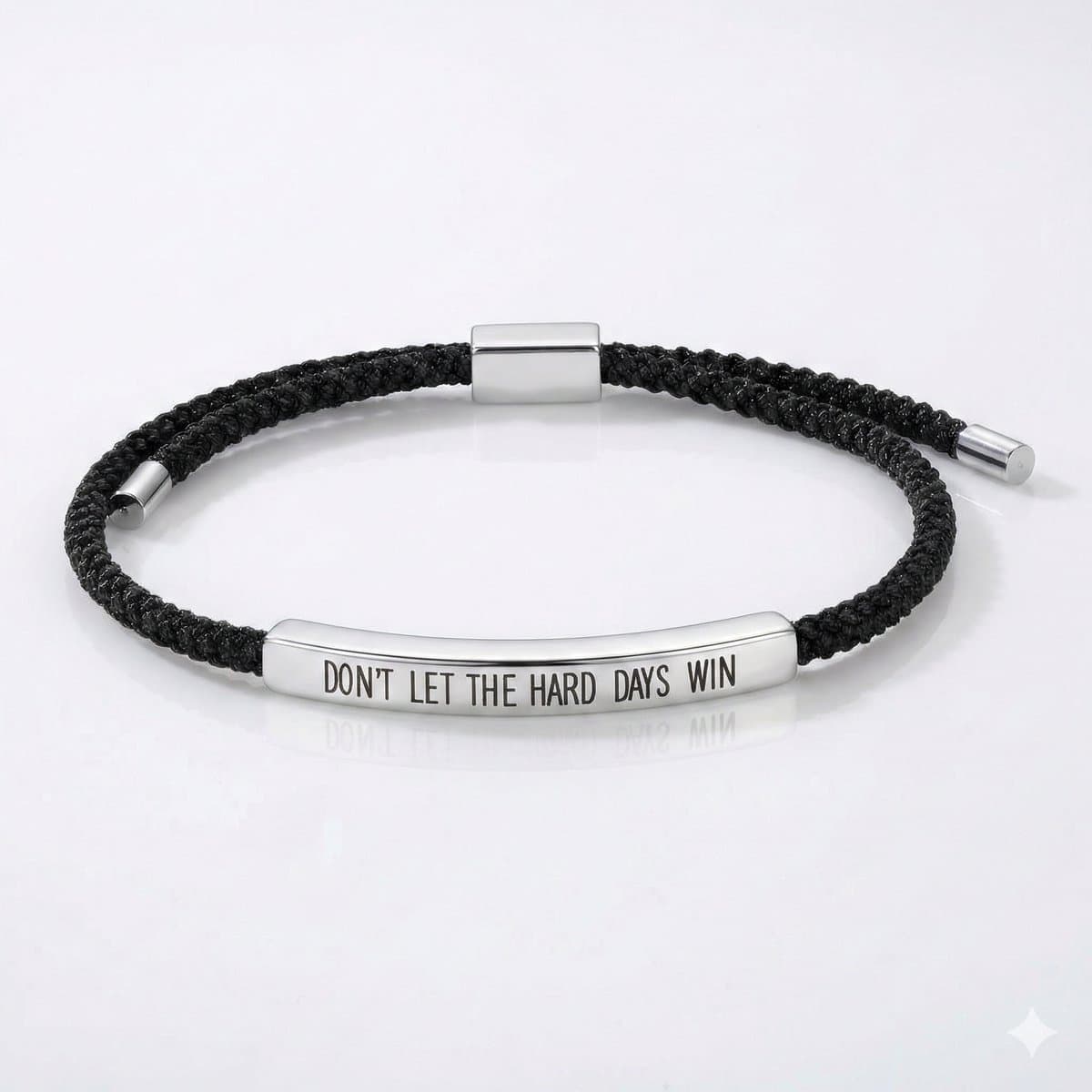 Zwart gevlochten koord armband voor heren en dames met zilverkleurige plaat en gegraveerde tekst "Don't Let The Hard Days Win" – verstelbaar (EAN: 8721381455563): Waarom ik ‘m uitprobeerde