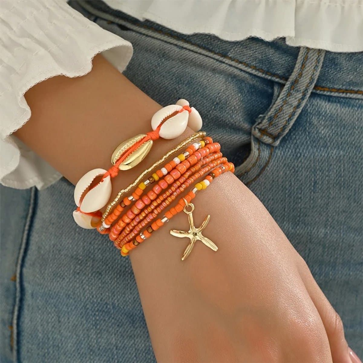 Sorprese Armband - Starfish - Oranje - Armband Dames - 7-Delig - Schelpjes - Elastisch - Model J (EAN: 8721025813841)