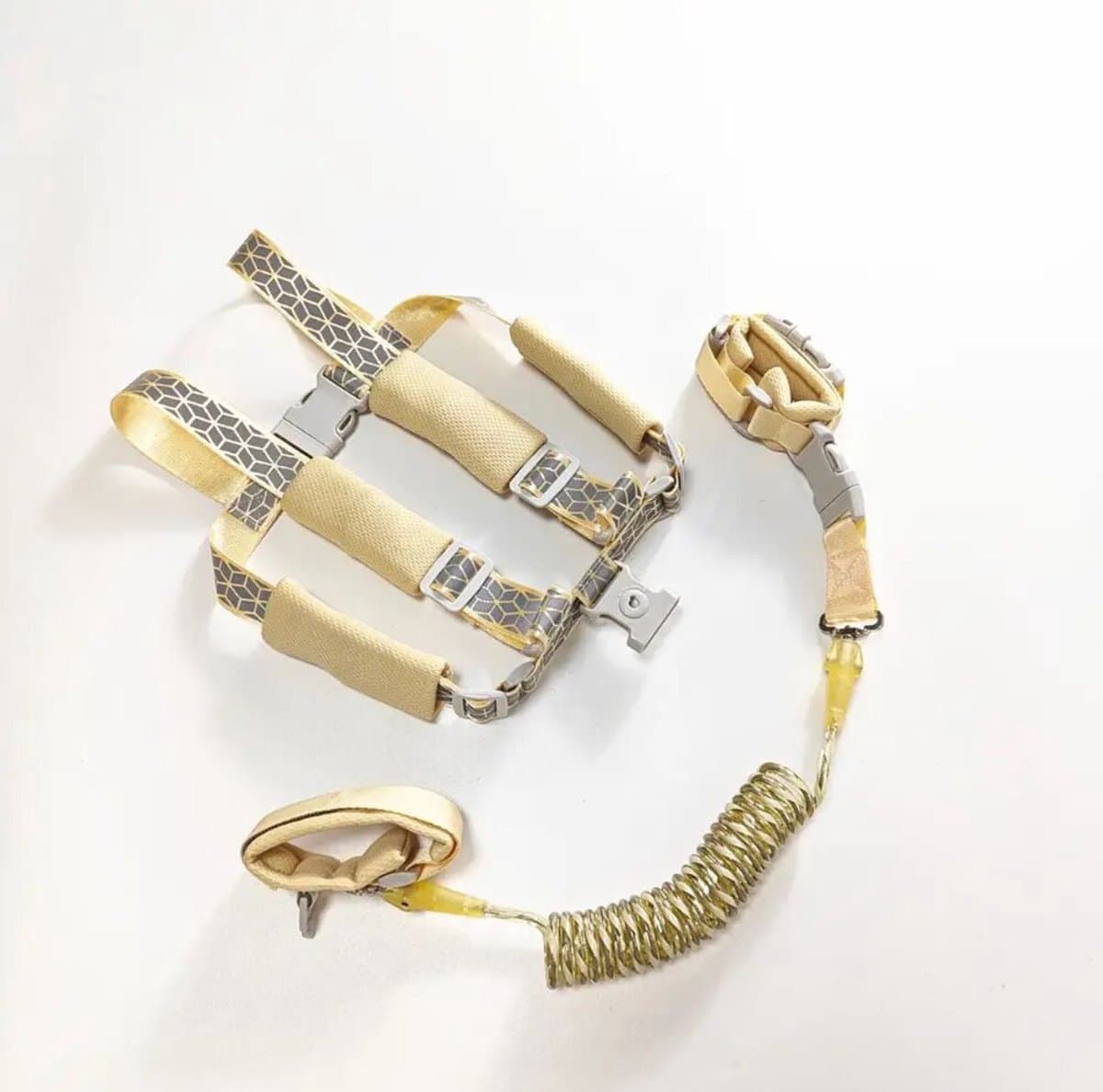 Moments 2 in 1 wandeltuigje - NR #1 Kindertuigje en Polstuigje met Slot - Glow in the Dark - Goud/ Zandkleurig - looplijn - Glow in the Dark (EAN: 8720039741836)