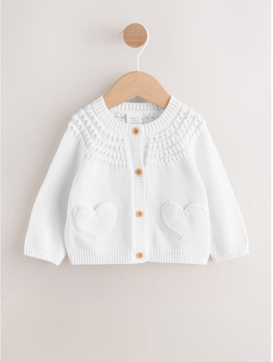 Next Babyvest met hartprint, knopen en zak (EAN: 5063599883459): **Een vest die straalt van persoonlijkheid**