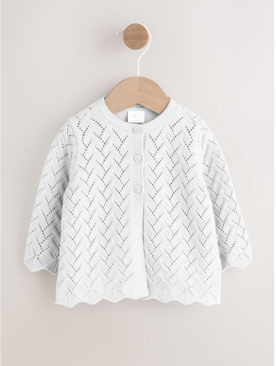 Next Gebreid ajourbabyvestje (EAN: 5063599602302): 🌱 Een Korte Intro Wat is het precies