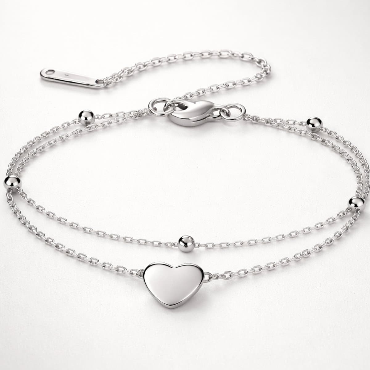 Lundholm Luxe Armband Dames Zilver Kleurig – Premium Stainless Steel Jewellery – Zilverkleurige Schakelarmband Dubbel Laags met Hartje & Bolletjes – My Uppsala Serie – Moederdag Cadeautjes cadeau voor mama Inclusief Luxe Geschenkverpakking (EAN: 8...